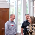 alumni having a conversation