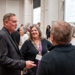 alumni having a conversation