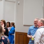 alumni posing for photo