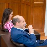 alumni sitting in chairs