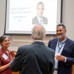 alumni having a conversation