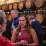 alumni speaking to each other