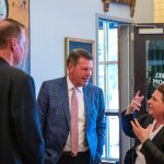 alumni speaking to each other