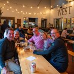 alumni posing for photo