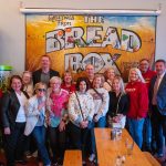 alumni posing for photo