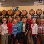 alumni posing for photo