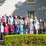 group of alumni posing for photo