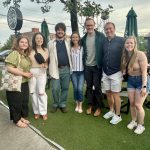 group of alumni posing for photo