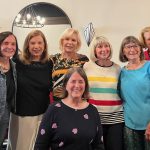 group of alumni posing for photo