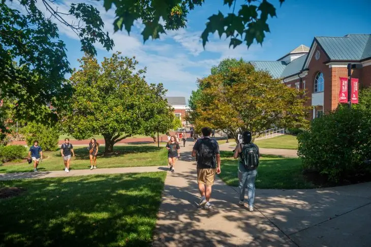students walking across campus