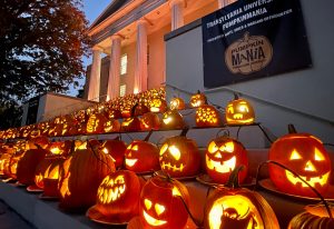 close up of lit pumpkins on old morrison steps
