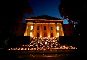 Old Morrison at night with steps decorated with lit pumkins