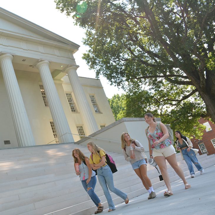 students walking past Old Morrison steps