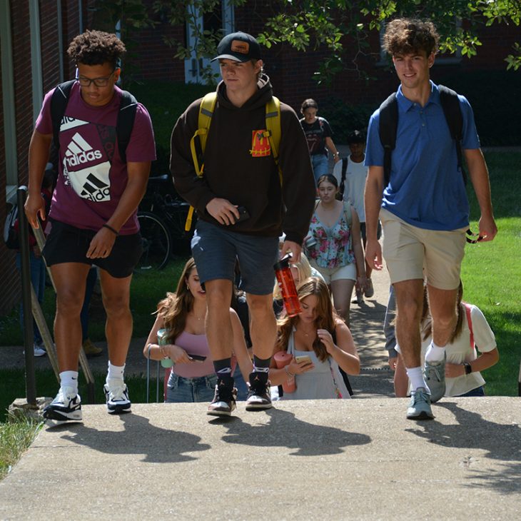 three students walking to class