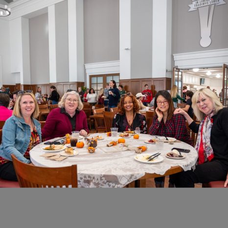 Group seated at table for meal