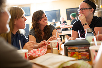 Students at a cafeteria table