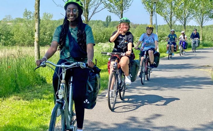 Students biking in the Netherlands as part of the travel May term course "Public Policy and the Culture of Health in the Netherlands."